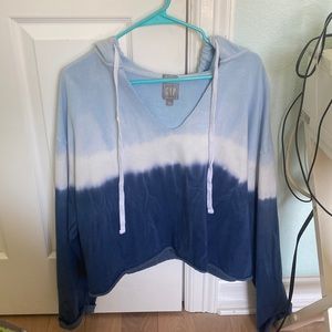 Large blue tie dye cropped hoodie from GAP.